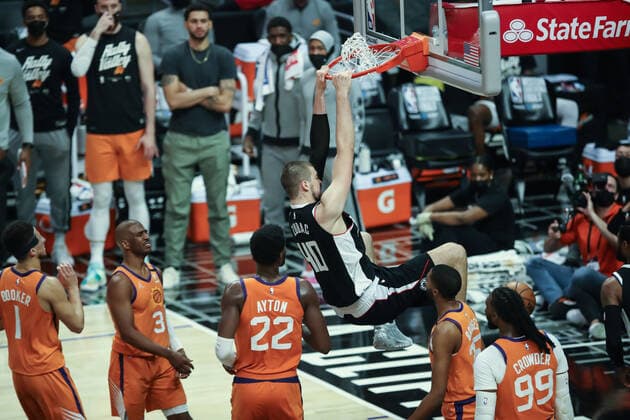 LOS ANGELES, CA - JUNE 24: LA Clippers center Ivica Zubac (40) hangs on the rim during the Phoenix Suns game versus the Los Angeles Clippers game 3 NBA, Basketball Herren, USA Western Conference Finals game on June 24, 2021, at Staples Center in Los Angeles, CA. (Photo by Jevone Moore Icon Sportswire) NBA: JUN 24 Western Conference Final - Suns at Clippers Icon210624049