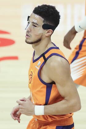 LOS ANGELES, CA - JUNE 24: Phoenix Suns guard Devin Booker (1) with new facemask during the Phoenix Suns game versus the Los Angeles Clippers game 3 NBA, Basketball Herren, USA Western Conference Finals game on June 24, 2021, at Staples Center in Los Angeles, CA. (Photo by Jevone Moore Icon Sportswire) NBA: JUN 24 Western Conference Final - Suns at Clippers Icon210624010
