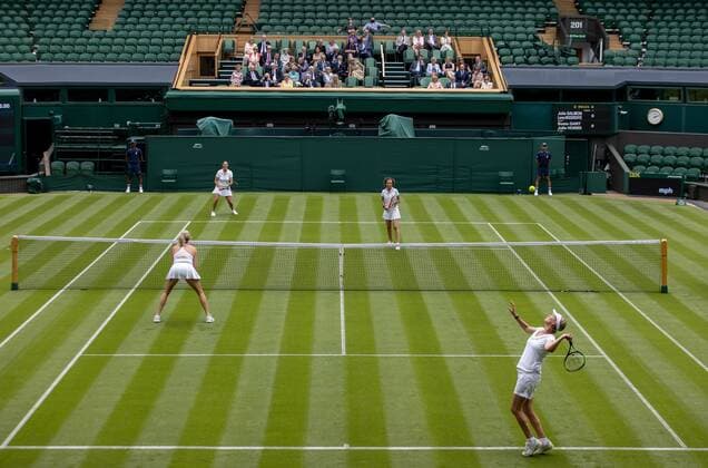Mandatory Credit: Photo by AELTC Shutterstock (12171009u) J.Salmon and L.Woodroffe playing against S.Dart and J.Hobbs in the traditional Championships opening match in the Test Doubles Round Robin with fellow AELTC members and friends in the Royal Box watching on Centre Court at The Championships 2021 Wimbledon Tennis Championships, Preparations, The All England Lawn Tennis and Croquet Club, London, UK - 26 Jun 2021 Editorial Use Only Wimbledon Tennis Championships, Preparations, The All England Lawn Tennis and Croquet Club, London, UK - 26 Jun 2021 Editorial Use Only  Copyright: xAELTC Shutterstockx 12171009u