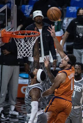 June 26, 2021, Los Angeles, California, USA: Devin Booker 1 of the Phoenix Suns puts up a shot over Marcus Morris 8 of the Los Angeles Clippers during Game 4 of the 2021 Western Conference finals NBA, Basketball Herren, USA playoff game on Saturday June 26, 2021 at the Staples Center in Los Angeles, California. Clippers lose to Suns 80 - 84. JAVIER ROJASPI Los Angeles USA - ZUMAp124 20210626_zaa_p124_005 Copyright: xx