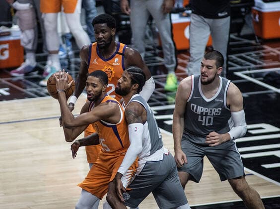 June 26, 2021, Los Angeles, California, USA: Mikal Bridges 25 of the Phoenix Suns is defended by Paul George 13 of the Los Angeles Clippers during Game 4 of the 2021 Western Conference finals NBA, Basketball Herren, USA playoff game on Saturday June 26, 2021 at the Staples Center in Los Angeles, California. Clippers lose to Suns 80 - 84. JAVIER ROJASPI Los Angeles USA - ZUMAp124 20210626_zaa_p124_006 Copyright: xx