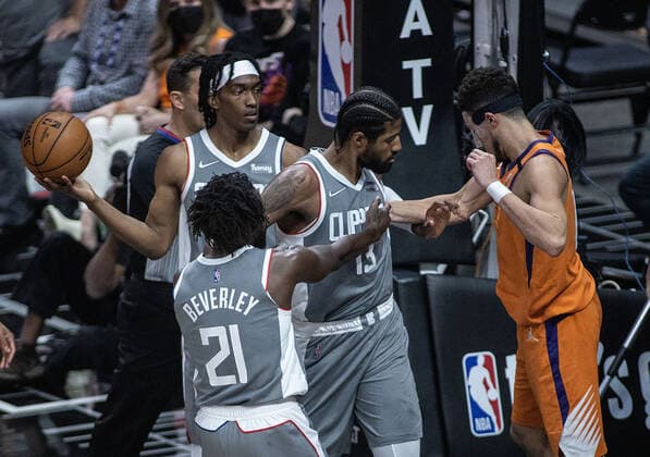 June 26, 2021, Los Angeles, California, USA: Paul George 13 of the Los Angeles Clippers pushes of Devin Booker 1 of the Phoenix Suns during Game 4 of the 2021 Western Conference finals NBA, Basketball Herren, USA playoff game on Saturday June 26, 2021 at the Staples Center in Los Angeles, California. Clippers lose to Suns 80 - 84. JAVIER ROJASPI Los Angeles USA - ZUMAp124 20210626_zaa_p124_012 Copyright: xx