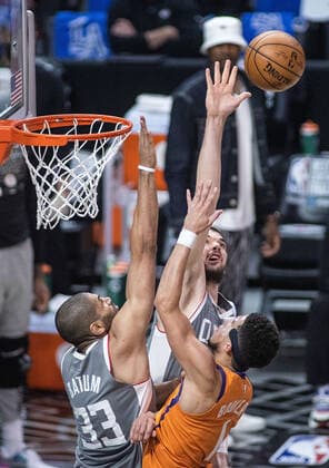 June 26, 2021, Los Angeles, California, USA: Nicolas Batum 33 and Ivica Zubac 40 of the Los Angeles Clippers block a shot by Devin Booker 1 of the Phoenix Suns during Game 4 of the 2021 Western Conference finals NBA, Basketball Herren, USA playoff game on Saturday June 26, 2021 at the Staples Center in Los Angeles, California. Clippers lose to Suns 80 - 84. JAVIER ROJASPI Los Angeles USA - ZUMAp124 20210626_zaa_p124_016 Copyright: xx