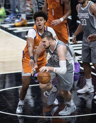 June 26, 2021, Los Angeles, California, USA: Ivica Zubac 40 of the Los Angeles Clippers is defended by Cameron Johnson 23 of the Phoenix Suns during Game 4 of the 2021 Western Conference finals NBA, Basketball Herren, USA playoff game on Saturday June 26, 2021 at the Staples Center in Los Angeles, California. Clippers lose to Suns 80 - 84. JAVIER ROJASPI Los Angeles USA - ZUMAp124 20210626_zaa_p124_018 Copyright: xx