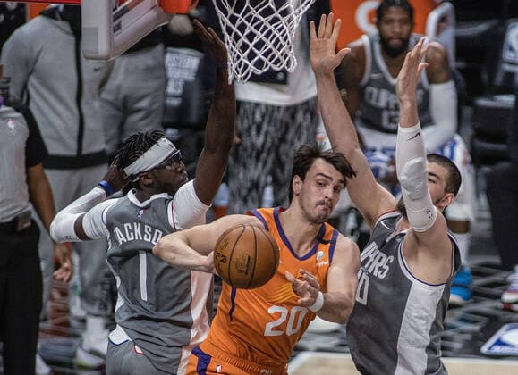 June 26, 2021, Los Angeles, California, USA: Reggie Jackson 1 and Ivica Zubac 40 of the Los Angeles Clippers defend against Dario Saric 20 of the Phoenix Suns during Game 4 of the 2021 Western Conference finals NBA, Basketball Herren, USA playoff game on Saturday June 26, 2021 at the Staples Center in Los Angeles, California. Clippers lose to Suns 80 - 84. JAVIER ROJASPI Los Angeles USA - ZUMAp124 20210626_zaa_p124_020 Copyright: xx