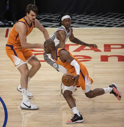 June 26, 2021, Los Angeles, California, USA: Chris Paul 3 of the Phoenix Suns drives past the pick by Dario Saric 20 blocking Terance Mann 14 of the Los Angeles Clippers during Game 4 of the 2021 Western Conference finals NBA, Basketball Herren, USA playoff game on Saturday June 26, 2021 at the Staples Center in Los Angeles, California. Clippers lose to Suns 80 - 84. JAVIER ROJASPI Los Angeles USA - ZUMAp124 20210626_zaa_p124_022 Copyright: xx