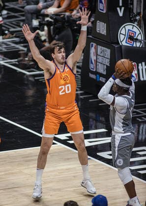 June 26, 2021, Los Angeles, California, USA: Reggie Jackson 1 of the Los Angeles Clippers looks to pass over Dario Saric 20 of the Phoenix Suns during Game 4 of the 2021 Western Conference finals NBA, Basketball Herren, USA playoff game on Saturday June 26, 2021 at the Staples Center in Los Angeles, California. Clippers lose to Suns 80 - 84. JAVIER ROJASPI Los Angeles USA - ZUMAp124 20210626_zaa_p124_024 Copyright: xx