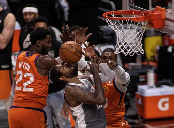 June 26, 2021, Los Angeles, California, USA: Paul George 13 of the Los Angeles Clippers is blocked by Deandre Ayton 22 and Jae Crowder 99 of the Phoenix Suns during Game 4 of the 2021 Western Conference finals NBA, Basketball Herren, USA playoff game on Saturday June 26, 2021 at the Staples Center in Los Angeles, California. Clippers lose to Suns 80 - 84. JAVIER ROJASPI Los Angeles USA - ZUMAp124 20210626_zaa_p124_029 Copyright: xx