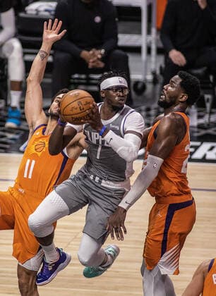 June 26, 2021, Los Angeles, California, USA: Reggie Jackson 1 of the Los Angeles Clippers tries to pass past Abdel Nader 11 and Deandre Ayton 22 of the Phoenix Suns during Game 4 of the 2021 Western Conference finals NBA, Basketball Herren, USA playoff game on Saturday June 26, 2021 at the Staples Center in Los Angeles, California. Clippers lose to Suns 80 - 84. JAVIER ROJASPI Los Angeles USA - ZUMAp124 20210626_zaa_p124_049 Copyright: xx