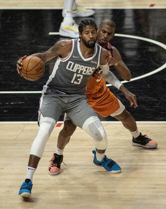 June 26, 2021, Los Angeles, California, USA: Paul George 13 of the Los Angeles Clippers is defended by Chris Paul 3 of the Phoenix Suns during Game 4 of the 2021 Western Conference finals NBA, Basketball Herren, USA playoff game on Saturday June 26, 2021 at the Staples Center in Los Angeles, California. Clippers lose to Suns 80 - 84. JAVIER ROJASPI Los Angeles USA - ZUMAp124 20210626_zaa_p124_060 Copyright: xx