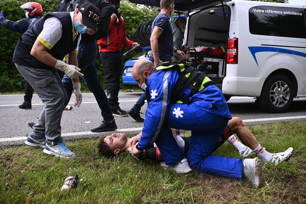 Swiss Mark Hirschi of UAE Team Emirates receives medical treatment after a fall in the first stage of the 108th edition of the Tour de France cycling race, 197,8km from Brest to Landerneau, France, Saturday 26 June 2021. This year s Tour de France takes place from 26 June to 18 July 2021. POOLxANNE-CHRISTINExPOUJOULAT  x3019970x
