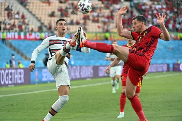 Portugal s Cristiano Ronaldo and Belgium s Jan Vertonghen fight for the ball during the round of 16 game of the Euro 2020 European Championship, EM, Europameisterschaft between the Belgian national soccer team Red Devils and Portugal, in Sevilla, Spain, Sunday 27 June 2021. LAURIExDIEFFEMBACQ  x3020828x