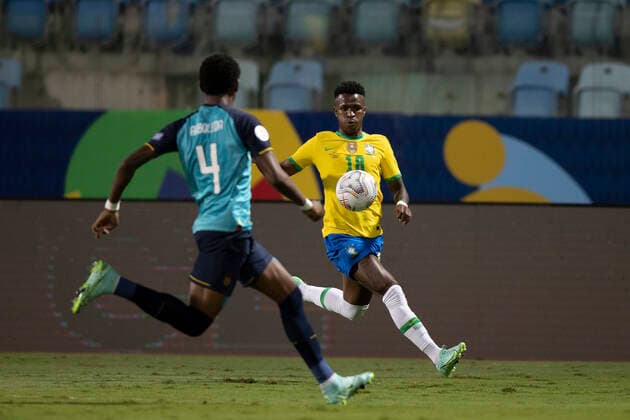 27th June 2021; Ol& xed;mpico Pedro Ludovico Teixeira Stadium, Goiania, Goias, Brazil; Copa America, Brazil versus Ecuador; Vin& xed;cius Jr. of Brazil comes forward covered by Arboleda of Ecuador  ActionPlus12300340 LucasxFigueiredo