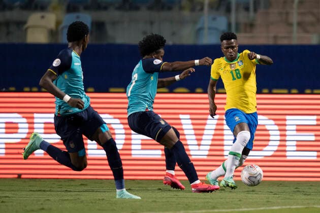 27th June 2021; Ol& xed;mpico Pedro Ludovico Teixeira Stadium, Goiania, Goias, Brazil; Copa America, Brazil versus Ecuador; Vin& xed;cius Jr. of Brazil takes on & xc1;ngelo Preciado of Ecuador  ActionPlus12300327 LucasxFigueiredo
