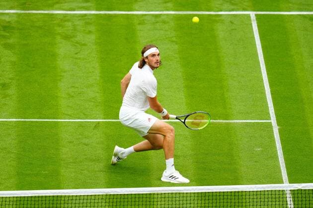 Mandatory Credit: Photo by Javier Garcia BPI Shutterstock (12172248ii) Stefanos Tsitsipas during his first round match Wimbledon Tennis Championships, Day 1, The All England Lawn Tennis and Croquet Club, London, UK - 28 Jun 2021 Wimbledon Tennis Championships, Day 1, The All England Lawn Tennis and Croquet Club, London, UK - 28 Jun 2021  Copyright: xJavierxGarcia BPI Shutterstockx 12172248ii