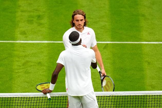 Mandatory Credit: Photo by Javier Garcia BPI Shutterstock (12172248jx) Stefanos Tsitsipas congratulates Frances Tiafoe after their first round match Wimbledon Tennis Championships, Day 1, The All England Lawn Tennis and Croquet Club, London, UK - 28 Jun 2021 Wimbledon Tennis Championships, Day 1, The All England Lawn Tennis and Croquet Club, London, UK - 28 Jun 2021  Copyright: xJavierxGarcia BPI Shutterstockx 12172248jx