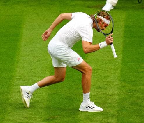 Mandatory Credit: Photo by Javier Garcia BPI Shutterstock (12172248ka) Stefanos Tsitsipas hits his racquet on the ground during his first round match Wimbledon Tennis Championships, Day 1, The All England Lawn Tennis and Croquet Club, London, UK - 28 Jun 2021 Wimbledon Tennis Championships, Day 1, The All England Lawn Tennis and Croquet Club, London, UK - 28 Jun 2021  Copyright: xJavierxGarcia BPI Shutterstockx 12172248ka