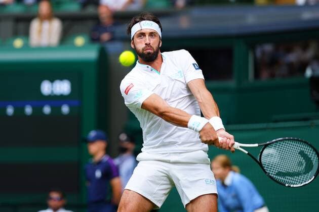 Mandatory Credit: Photo by Javier Garcia BPI Shutterstock (12172248oa) Nikoloz Basilashvili during his first round match Wimbledon Tennis Championships, Day 1, The All England Lawn Tennis and Croquet Club, London, UK - 28 Jun 2021 Wimbledon Tennis Championships, Day 1, The All England Lawn Tennis and Croquet Club, London, UK - 28 Jun 2021  Copyright: xJavierxGarcia BPI Shutterstockx 12172248oa