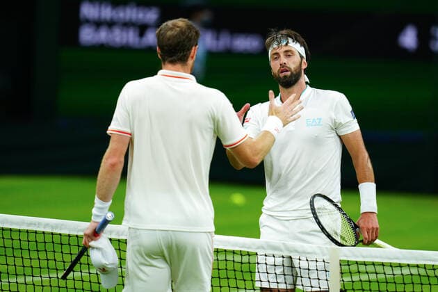 Mandatory Credit: Photo by Javier Garcia BPI Shutterstock (12172248vd) Andy Murray celebrates victory in his first round match and is congratulated by Nikoloz Basilashvili Wimbledon Tennis Championships, Day 1, The All England Lawn Tennis and Croquet Club, London, UK - 28 Jun 2021 Wimbledon Tennis Championships, Day 1, The All England Lawn Tennis and Croquet Club, London, UK - 28 Jun 2021  Copyright: xJavierxGarcia BPI Shutterstockx 12172248vd