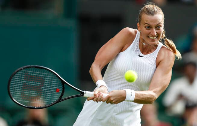 (210629) -- LONDON, June 29, 2021 -- Petra Kvitova of Czech Republic competes during the women s singles first round match between Sloane Stephens of the United States and Petra Kvitova of Czech Republic at the 2021 Wimbledon Tennis Championships in London, Britain, on June 28, 2021. ) (SP)BRITAIN-LONDON-TENNIS-WIMBLEDON-DAY 1 HanxYan 