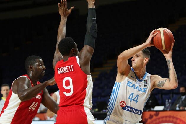 June 29, 2021, Victoria, BC, Canada: Canada s Andrew Nicholson, left, and teammate RJ Barrett defend against Greece s Mitoglou Konstantinos during first half FIBA Men s Olympic Qualifying basketball action at Memorial Arena in Victoria, Tuesday, June 29, 2021. Andrew Nicholson,RJ Barrett, Mitoglou Konstantinos  - ZUMAc35_ 20210629_zaf_c35_022 Copyright: xChadxHipolitox