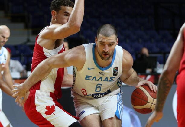 June 29, 2021, Victoria, BC, Canada: Canada s Dwight Powell tries to block Greece s Vassilis Kavvadas during second half FIBA Men s Olympic Qualifying basketball action at Memorial Arena in Victoria, Tuesday, June 29, 2021. Dwight Powell,Vassilis Kavvadas,  - ZUMAc35_ 20210629_zaf_c35_029 Copyright: xChadxHipolitox