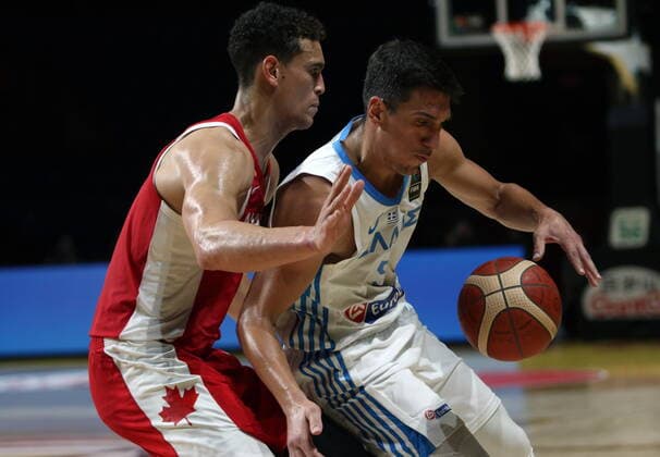 June 29, 2021, Victoria, BC, Canada: Canada s Dwight Powell guards Greece s Giannoulis Larentzakis during second half FIBA Men s Olympic Qualifying basketball action at Memorial Arena in Victoria, Tuesday, June 29, 2021. Dwight Powell,Giannoulis Larentzakis,  - ZUMAc35_ 20210629_zaf_c35_031 Copyright: xChadxHipolitox