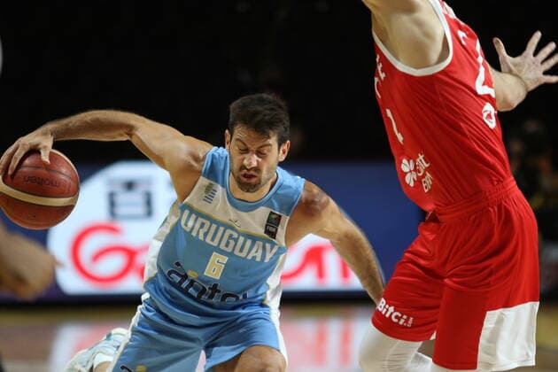 June 29, 2021, Victoria, BC, Canada: Uruguay s Bruno Fitipaldo, left, tries to move around Turkey s Sehmus Hazer during first half FIBA Men s Olympic Qualifying basketball action at Memorial Arena in Victoria, Tuesday, June 29, 2021. Bruno Fitipaldo  - ZUMAc35_ 20210629_zaf_c35_036 Copyright: xChadxHipolitox