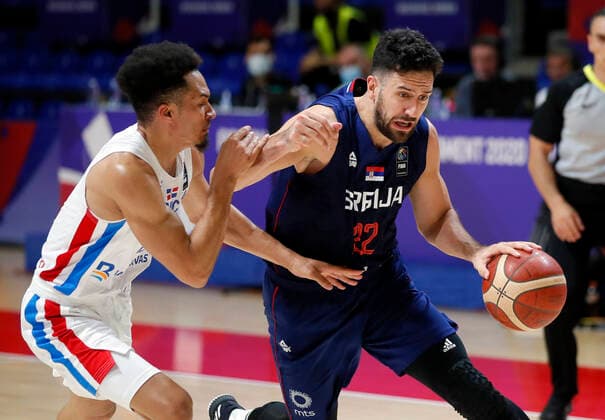 (210630) -- BELGRADE, June 30, 2021 -- Serbia s Vasilije Micic (R) vies with Dominican Republic s Rigoberto Mendoza during FIBA Olympic Qualifying Tournament basketball match between Serbia and Dominican Republic in Belgrade, Serbia on June 29, 2021. (Photo by Xinhua) (SP)SERBIA-BELGRADE-BASKETBALL-FIBA OQT-DOMINICAN REPUBLIC VS SERBIA PredragxMilosavljevic 