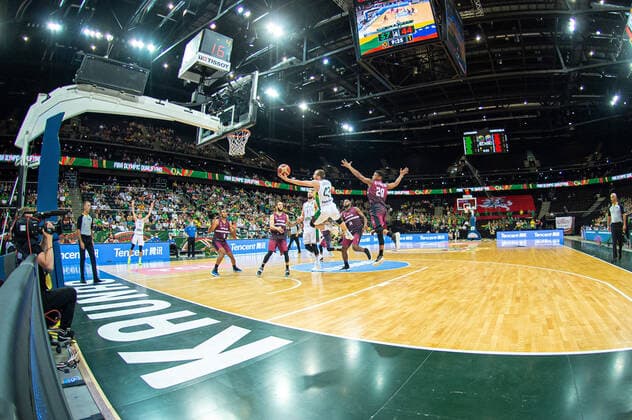 (210630) -- KAUNAS, June 30, 2021 -- Lukas Lekavicius (Top L) of Lithuania goes for the basket during FIBA Olympic Qualifyng Tournament basketball match between Lithuania and Venezuela in Kaunas, Lithuania, June 29, 2021. (Photo by Xinhua) (SP)LITHUANIA-KAUNAS-BASKETBALL-FIBA OQT-LITHUANIA VS VENEZUELA AlfredasxPliadis 