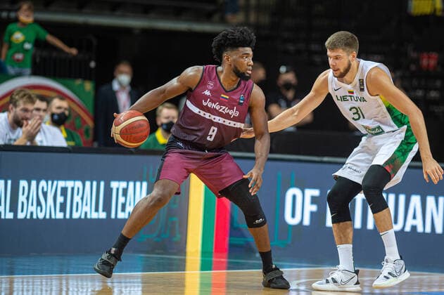 (210630) -- KAUNAS, June 30, 2021 -- Pedro Chourio (L) of Venezuela competes during FIBA Olympic Qualifyng Tournament basketball match between Lithuania and Venezuela in Kaunas, Lithuania, June 29, 2021. (Photo by Xinhua) (SP)LITHUANIA-KAUNAS-BASKETBALL-FIBA OQT-LITHUANIA VS VENEZUELA AlfredasxPliadis 