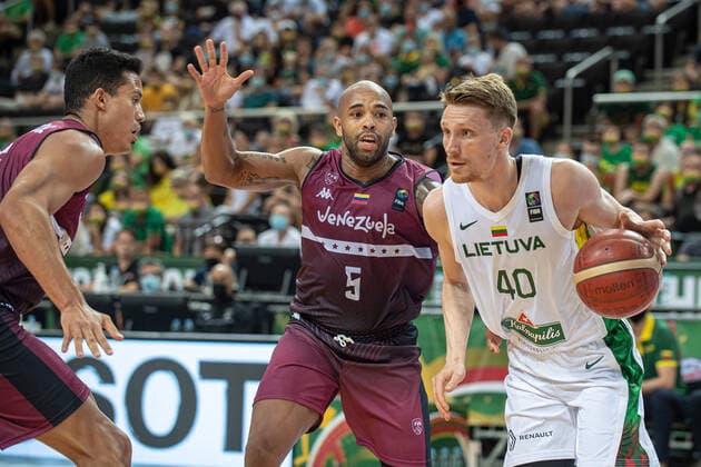 (210630) -- KAUNAS, June 30, 2021 -- Marius Grigonis (R) of Lithuania competes during FIBA Olympic Qualifyng Tournament basketball match between Lithuania and Venezuela in Kaunas, Lithuania, June 29, 2021. (Photo by Xinhua) (SP)LITHUANIA-KAUNAS-BASKETBALL-FIBA OQT-LITHUANIA VS VENEZUELA AlfredasxPliadis 