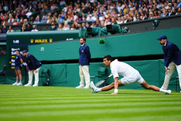 Mandatory Credit: Photo by Javier Garcia BPI Shutterstock (12189891i) Novak Djokovic slips during his second round match Wimbledon Tennis Championships, Day 3, The All England Lawn Tennis and Croquet Club, London, UK - 30 Jun 2021 Wimbledon Tennis Championships, Day 3, The All England Lawn Tennis and Croquet Club, London, UK - 30 Jun 2021  Copyright: xJavierxGarcia BPI Shutterstockx 12189891i