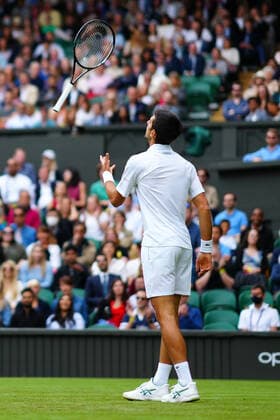 Mandatory Credit: Photo by Javier Garcia BPI Shutterstock (12189891dk) Novak Djokovic throws his racquet into the air during his second round match Wimbledon Tennis Championships, Day 3, The All England Lawn Tennis and Croquet Club, London, UK - 30 Jun 2021 Wimbledon Tennis Championships, Day 3, The All England Lawn Tennis and Croquet Club, London, UK - 30 Jun 2021  Copyright: xJavierxGarcia BPI Shutterstockx 12189891dk