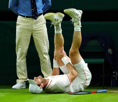 Mandatory Credit: Photo by Javier Garcia BPI Shutterstock (12189891pa) Andy Murray slipping during his second round match Wimbledon Tennis Championships, Day 3, The All England Lawn Tennis and Croquet Club, London, UK - 30 Jun 2021 Wimbledon Tennis Championships, Day 3, The All England Lawn Tennis and Croquet Club, London, UK - 30 Jun 2021  Copyright: xJavierxGarcia BPI Shutterstockx 12189891pa