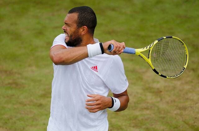 Mandatory Credit: Photo by Shutterstock (12190133cn) Jo Wilfried Tsonga of France in action Wimbledon Tennis Championships, Day 3, The All England Lawn Tennis and Croquet Club, London, UK - 30 Jun 2021 Wimbledon Tennis Championships, Day 3, The All England Lawn Tennis and Croquet Club, London, UK - 30 Jun 2021  Copyright: xShutterstockx 12190133cn