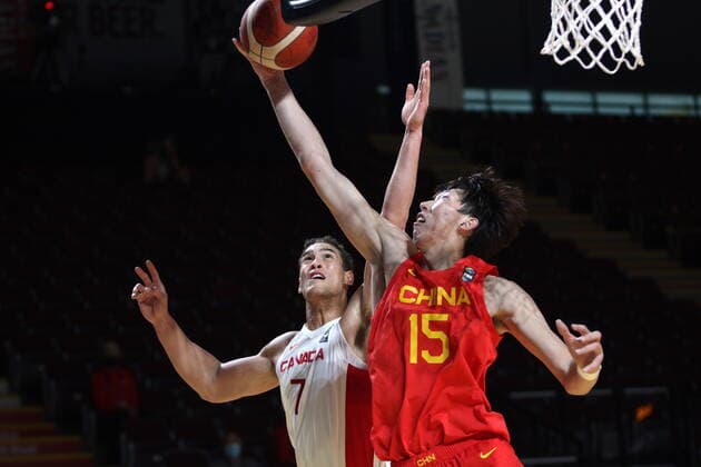 June 30, 2021, Victoria, BC, Canada: Canada s Dwight Powell battles with China s Qi Zhou during the first half of FIBA Men s Olympic Qualifying basketball action at Memorial Arena in Victoria, B.C., on Wednesday, June 30, 2021. Dwight Powell, Qi Zhou,  - ZUMAc35_ 20210630_zaf_c35_057 Copyright: xChadxHipolitox
