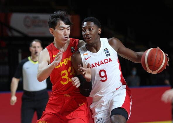 June 30, 2021, Victoria, BC, Canada: Canada s RJ Barrett protects the ball from China s Qian Wu during the first half of FIBA Men s Olympic Qualifying basketball action at Memorial Arena in Victoria, B.C., on Wednesday, June 30, 2021. RJ Barrett, Qian Wu,  - ZUMAc35_ 20210630_zaf_c35_062 Copyright: xChadxHipolitox