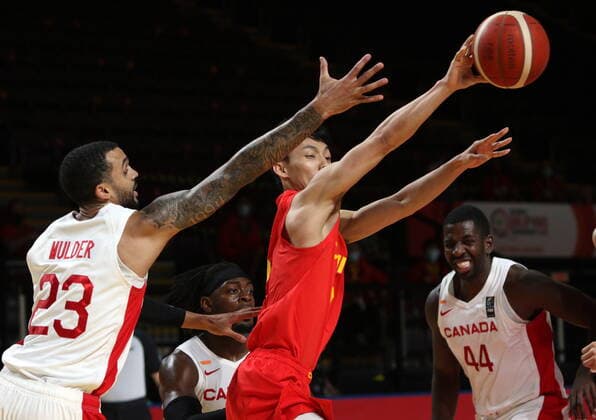 June 30, 2021, Victoria, BC, Canada: Canada s Mychal Mulder tries to defend against China s Jie Xu during the second half of FIBA Men s Olympic Qualifying basketball action at Memorial Arena in Victoria, B.C., on Wednesday, June 30, 2021. Mychal Mulder,Jie Xu  - ZUMAc35_ 20210630_zaf_c35_069 Copyright: xChadxHipolitox