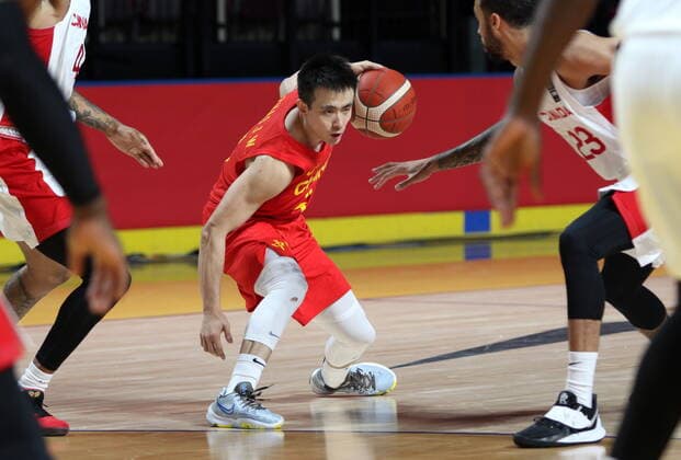 June 30, 2021, Victoria, BC, Canada: China s Jiwei Zhao protects the ball against Canada during the second half of FIBA Men s Olympic Qualifying basketball action at Memorial Arena in Victoria, B.C., on Wednesday, June 30, 2021. Jiwei Zhao  - ZUMAc35_ 20210630_zaf_c35_070 Copyright: xChadxHipolitox