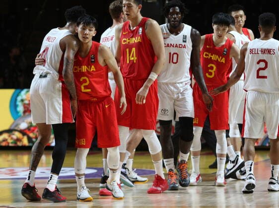 June 30, 2021, Victoria, BC, Canada: China s Jie Xu, second left, congratulates Canada s Nickeil Alexander-Walker and teammates at the end of the second half of FIBA Men s Olympic Qualifying basketball action at Memorial Arena in Victoria, B.C., on Wednesday, June 30, 2021. Jie Xu,Nickeil Alexander-Walker  - ZUMAc35_ 20210630_zaf_c35_072 Copyright: xChadxHipolitox