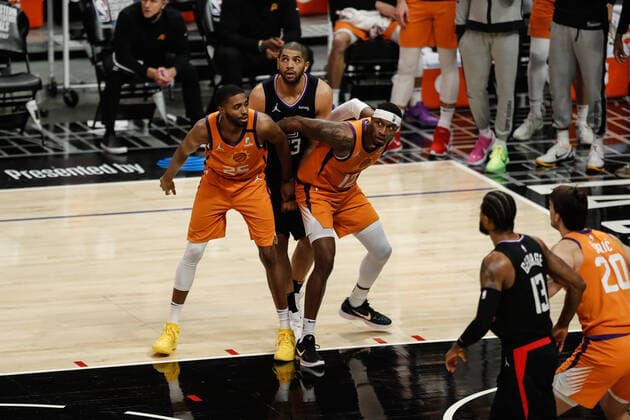 LOS ANGELES, CA - JUNE 30: LA Clippers forward Nicolas Batum (33) boxed out by Phoenix Suns forward Mikal Bridges (25) and Phoenix Suns forward Torrey Craig (12) during game 6 of the NBA, Basketball Herren, USA Western Conference Final between the Phoenix Suns and the Los Angeles Clippers on June 30, 2021, at Staples Center in Los Angeles, CA. (Photo by Jevone Moore Icon Sportswire) NBA: JUN 30 Western Conference Final - Suns at Clippers Icon210630023