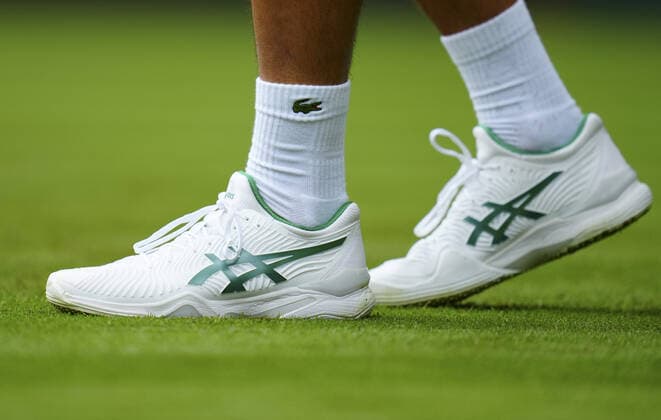 Mandatory Credit: Photo by Javier Garcia BPI Shutterstock (12189891qi) The Asics tennis shoes of Novak Djokovic Wimbledon Tennis Championships, Day 3, The All England Lawn Tennis and Croquet Club, London, UK - 30 Jun 2021 Wimbledon Tennis Championships, Day 3, The All England Lawn Tennis and Croquet Club, London, UK - 30 Jun 2021  Copyright: xJavierxGarcia BPI Shutterstockx 12189891qi