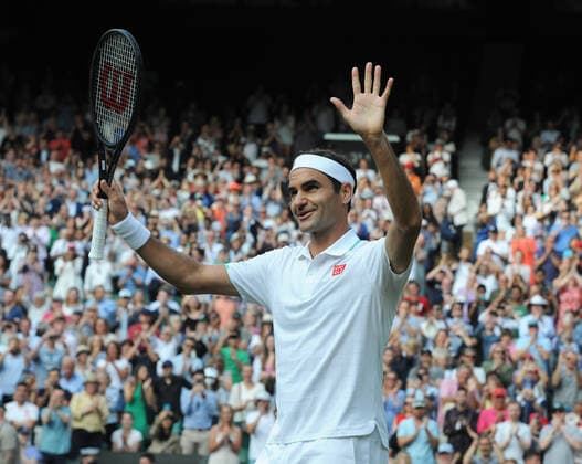 Tennis - 2021 All England Championship - Week One - Day Four (Thursday) - Wimbledon Roger Federer v Richard Gasquet Roger Federer salutes the crowd after winning the match 
