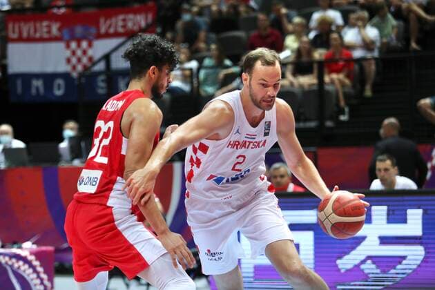 PXL_Croatia v Tunisia - Group A: 2020 FIBA Men s Olympic Qualifying Tournaments SPLIT, CROATIA - JULY 01: Ahmed Addami of Tunisia guards Miro Bilan of Croatia takes the ball towards the basket during the 2020 FIBA Men s Olympic Qualifying Tournament game between Croatia and Tunisia at Spaladium Arena on July 1, 2021 in Split, Croatia. IvoxCagalj PIXSELL