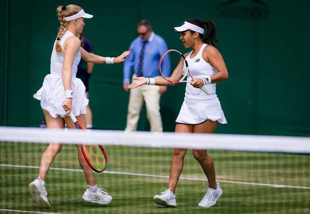 Mandatory Credit: Photo by Rob Prange Shutterstock (12191441gx) Heather Watson of Great Britain playing doubles with Harriet Dart at the 2021 Wimbledon Championships Grand Slam tennis tournament Wimbledon Tennis Championships, Day 4, The All England Lawn Tennis and Croquet Club, London, UK - 01 Jul 2021 Wimbledon Tennis Championships, Day 4, The All England Lawn Tennis and Croquet Club, London, UK - 01 Jul 2021  Copyright: xRobxPrange Shutterstockx 12191441gx