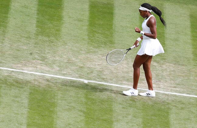 (210702) -- LONDON, July 2, 2021 -- Coco Gauff of the United States reacts during the women s singles second round match between Coco Gauff of the United States and Elena Vesnina of Russia at Wimbledon Championship in London, Britain, on July 1, 2021. ) (SP)BRITAIN-LONDON-TENNIS-WIMBLEDON-DAY 4 HanxYan 