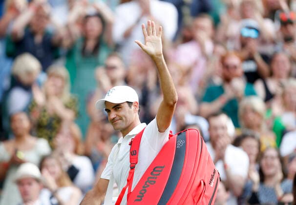 (210702) -- LONDON, July 2, 2021 -- Roger Federer of Switzerland greets the spectators after winning the men s singles second round match between Roger Federer of Switzerland and Richard Gasquet of France at Wimbledon Championship in London, Britain, on July 1, 2021. ) (SP)BRITAIN-LONDON-TENNIS-WIMBLEDON-DAY 4 HanxYan 