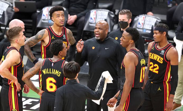 July 1, 2021, Milwaukee, WI, USA: Atlanta Hawks interim head coach Nate McMillan with, from left, Bogdan Bogdanovic, John Collins, Lou Williams, Onyeka Okongwu, and Cam Reddish, looks for answers during a time out against the Milwaukee Bucks during the third quarter in Game 5 of the Eastern Conference Finals on Thursday, July 1, 2021, at Fiserv Forum in Milwaukee. The Bucks won, 123-112, for a 3-2 series lead. Milwaukee USA - ZUMAm67_ 0123801172st Copyright: xCurtisxComptonx