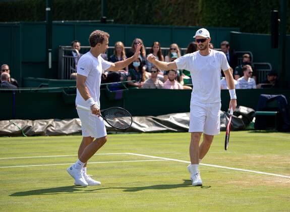 Mandatory Credit: Photo by AELTC Shutterstock (12193266l) Jamie Murray (GBR) and Bruno Soares (BRA) celebrate after winning a point against Nicholas Monroe (USA) and Vasek Pospisil (CAN) in the first round of the Gentlemen s Doubles on Court 14 at The Championships 2021 Wimbledon Tennis Championships, Day 5, The All England Lawn Tennis and Croquet Club, London, UK - 02 Jul 2021 Editorial Use Only Wimbledon Tennis Championships, Day 5, The All England Lawn Tennis and Croquet Club, London, UK - 02 Jul 2021 Editorial Use Only  Copyright: xAELTC Shutterstockx 12193266l